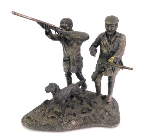 An Evergreen Studio Collection shooting model, the Sporting Scenes from Evergreen Studios Collection signed John Bull, depicting two figures and dog, 16cm high. (AF)