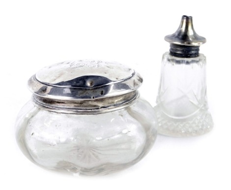 Two silver topped and cut glass items, comprising dressing table jar bearing the initials EJ, 6cm high, and a salt, 7cm high. (2)