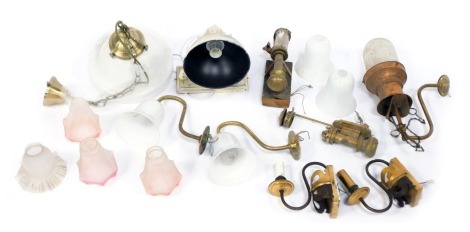 A group of light fittings, shades, etc., to include frosted glass shades, milk glass shades, a milk glass ceiling light of circular form with brass mounts, etc. (3 boxes)