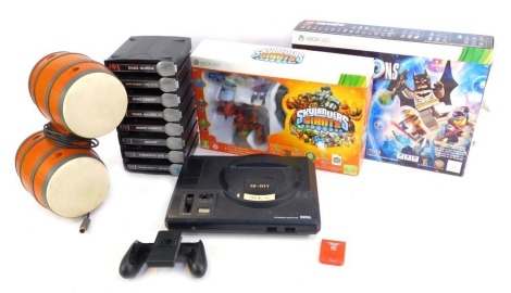 Various games, to include an Xbox 360 Skylander Giants set, Lego Dimensions starter pack, a Sega Mega Drive, Nintendo Switch stand, various PlayStation games, and a set of Nintendo DK drums.