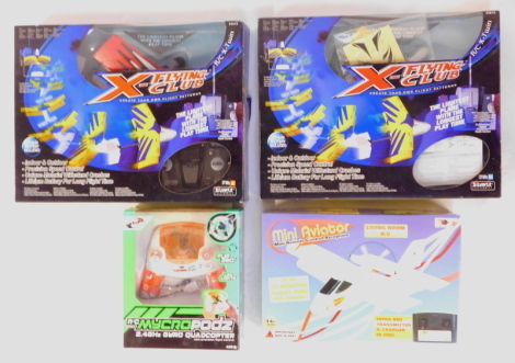 Aircraft models, comprising two silver lit electronics R/C X/Twin Flying Club kit builds, boxed, a Mini Aviators mini remote control aeroplane, and a Bladez Toys RC Mycropodz quad copter, boxed. (4)