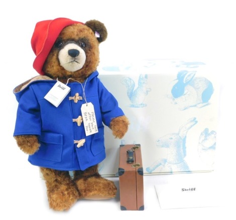 A Steiff mohair Paddington Bear, with suitcase, plush marmalade sandwich and glass jar of orange marmalade, limited edition of 500, 60cm high, with certificate, boxed with outer packaging.