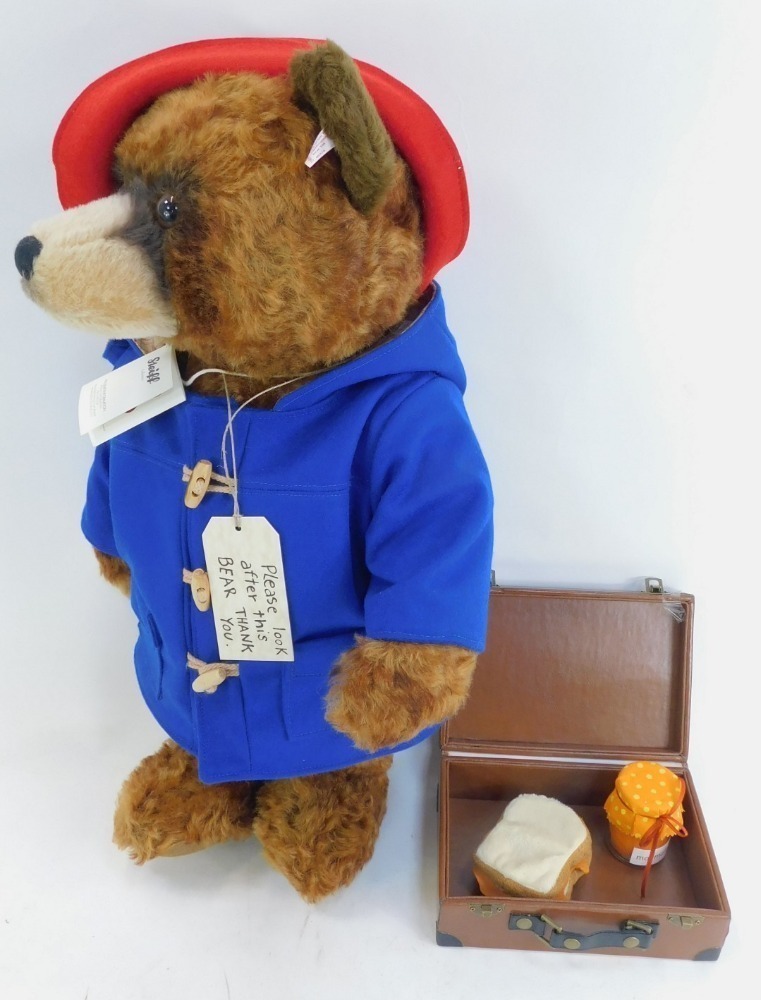 A Steiff mohair Paddington Bear, with suitcase, plush