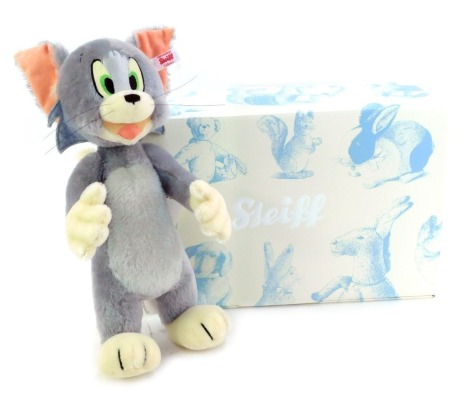 A Steiff Tom soft toy, limited edition number 1134/2000, 33cm high, with certificate, boxed with outer packaging.