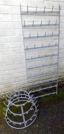 Galvanised hanging racks, comprising a three tier circular hanging rack, 37cm high, and a rectangular wall mounted hanging rack, 136cm x 49cm. (2)