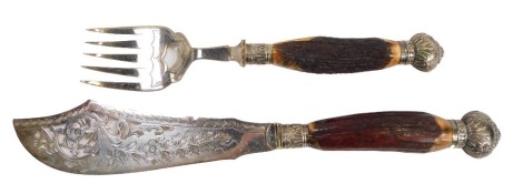 An antler handled fish serving set, with silver plated blades and collars.