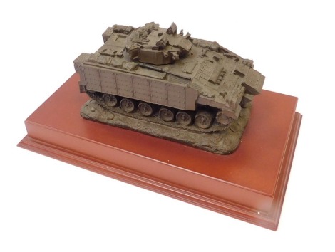 A Martin Duchemin armored tank model, bronzed effect set on a yew wood rectangular base, 12cm high, 29cm wide, 16cm deep. (AF)