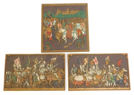 Three Marcus Designs cast metal and painted wall plaques, depicting medieval figures on horseback, 36cm x 34cm, and two scenes depicting medieval figures in armour, 25cm x 41cm.