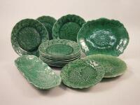 A quantity of 19thC and later Wedgwood type green leaf moulded plates etc.