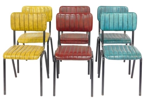 A set of six retro style dining chairs, each with a leatherette upholstered seat and back, in blue, lime green and burgundy, each with metal frame.