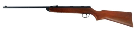 A BSA Meteor .22 calibre air rifle, 103cm long, together with a Geilert shooting hide, in army style camouflage print. (2)