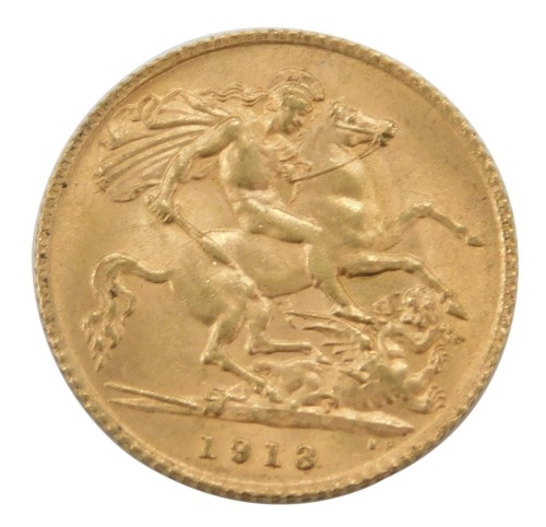 A George V half gold sovereign, dated 1913.