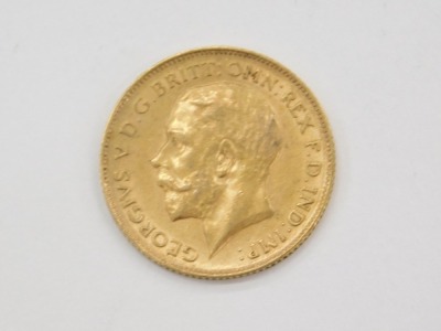 A George V half gold sovereign, dated 1911. - 2