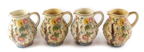 Four H J Wood Ltd Indian Tree relief moulded jugs.