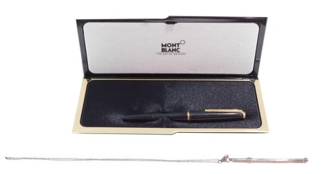 A Mont Blanc fountain pen, with 14k gold nib, boxed, together with a silver Deco swizzle stick on necklace.