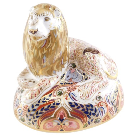 A Royal Crown Derby lion large paperweight, on a moulded base, with silver stopper, dated 1996 LX, 16cm high.