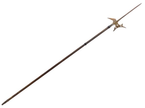 A replica iron Halberd, with pierced decoration and wooden shaft, 232cm long.