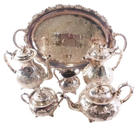 A John Turton silver plated six piece tea service, each with a bird shaped knop, and an oval two handled tray.