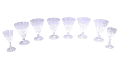 A set of six Waterford wine glasses, each with a cut tapering bowl, 14cm high, and two smaller glasses, 12cm high. (8)