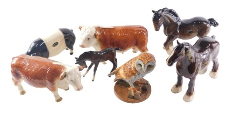 A quantity of ceramic animals and birds, to include Royal Doulton barn animal, Hereford bull, Coppercraft pig, etc.