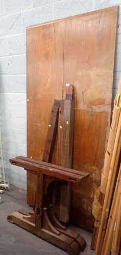 A mahogany refectory table, with two plank top, on trestle support ends, the top 215cm x 103cm, 3cm thick.