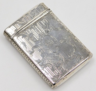 A Victorian silver cigar case, of oblong form, with a hinged lid, engraved centrally with a cartouche of huntsmen and hounds, within a ground with engine turned decoration, foliate scroll and fruit engraving, Taylor & Kerry, Birmingham 1847, 4.36oz. - 2