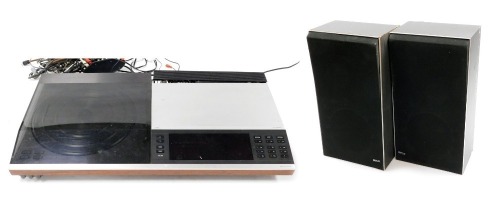 A Bang & Olufsen Beoscenter 7007, with cabling, serial number 04336342, together with two Bang & Olufsen Beovox X25 speakers.