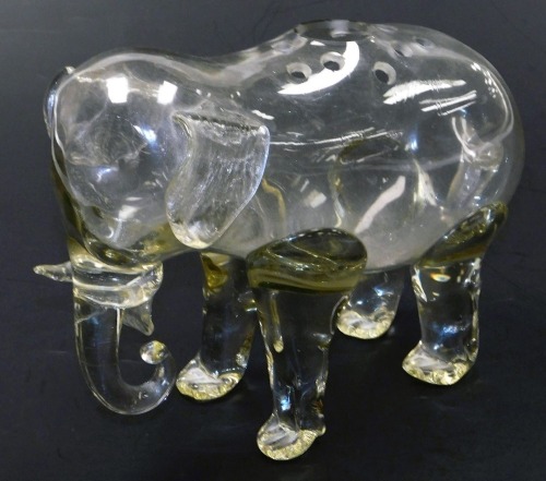 A late 19thC Loetz style glass flower holder, modelled as a standing elephant, with one large and twelve small round flower holes, 30.5cm wide.