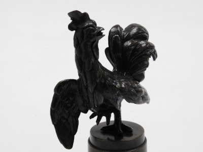 An early 20thC bronze figure of a cockerel, modelled on a circular plinth and square base, 20.5cm high. - 2