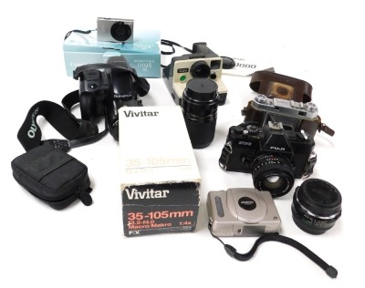 A Fuji STX-2 camera, Olympus IS-1000 camera, Canon Digital IXUS70 camera, further cameras, etc. (qty)