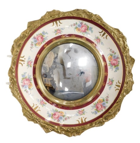 A Burleigh ware pottery and brass framed convex circular wall mirror, printed with sprays of flowers, printed marks, 38.5cm wide.