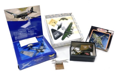 A Corgi diecast model of a WWII Douglas C-47 'Dakota', -RAF Y-SL KG374 (D Day), AA3003, together with a B-17 Memphis Belle, Atlas editions, and two further aircraft, and a metal relief model of the Canberra PR7 1957-1969. (5)