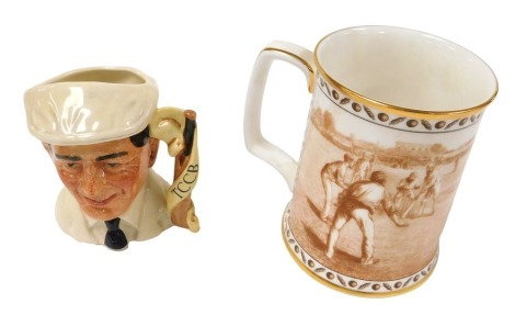 A Royal Doulton character jug of "Dickie" Bird MBE, limited edition 2748/9500, D7068, together with a porcelain tankard The History of the Ashes, limited edtion 256/2500. (2)