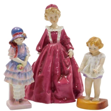 A Royal Worcester figure modelled as Grandmother's Dress, 3081, another modelled as Joan, 2915, and a Royal Doulton figure modelled as Pinkie, HN1559. (3)(AF)