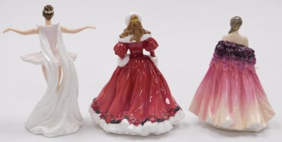 A Coalport porcelain figure modelled as Dame Margot Fonteyn, as Cinderella, limited edition for Compton Woodhouse, together with two Royal Doulton figures, modelled as Elizabeth HN5034, and A Christmas Morning HN4894. (3) - 2