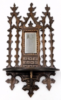 A Victorian walnut and inlaid writing slope, the hinged lid opening to reveal a leather slope and fitted interior, 14.5cm high, 34.5cm wide, 22cm deep, together with a late 19thC Continental wall shelf, with a Gothic mirrored back, 43cm high. (2) - 2