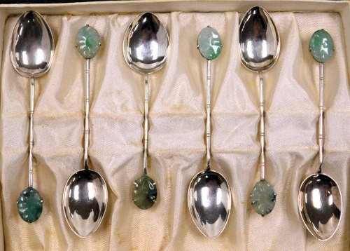 A set of six 20thC Hong Kong teaspoons, with carved jade terminals, stamped silver, boxed, 1.65oz all in.