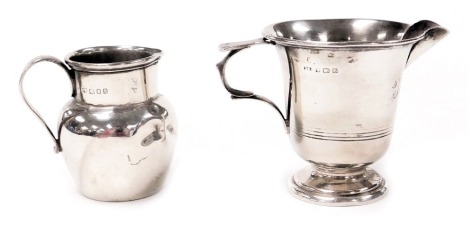 A George V silver cream jug, Birmingham 1926, and a further cream jug, London 1918, 4.36oz.