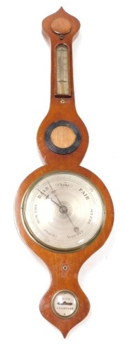 A 19thC mahogany wheel barometer, by Green of Grantham, with a silvered dial, thermometer, and spirit level, the case with boxwood line inlay, 96cm high.