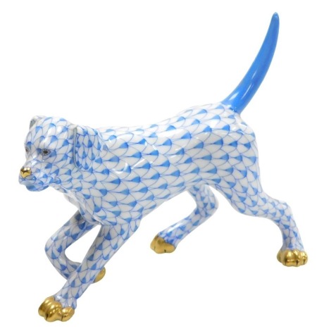 A Herend porcelain figure of a labrador, blue scale ground, printed and painted marks, 14.5cm wide.