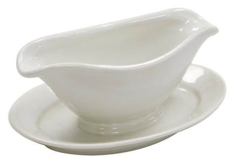 A Third Reich Luftwaffe pottery sauce boat, by Schonwald, of double lipped form, with an integral stand, dated 1938, printed marks, 24cm wide.