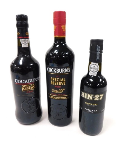 A bottle of Cockburns Special Reserve port, Number One Special Reserve port, and a half bottle of Fonseca Bin 27 Reserve port. (3)