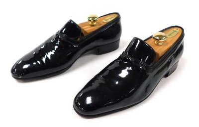 A pair of Harrods patent leather gentleman's evening shoes, size 8, with wooden stays.