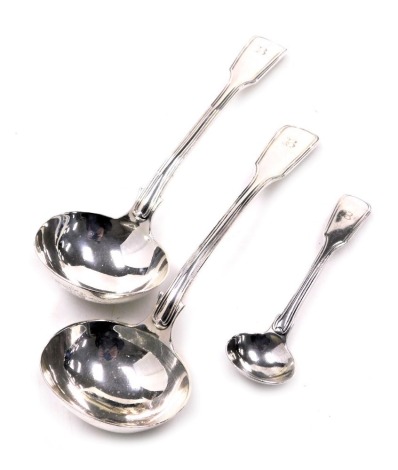 A pair of Victorian Fiddle and Thread silver sauce ladles, initial engraved, Charles Boyton II, London 1893, together with a William IV Fiddle and Thread silver mustard spoon, initial engraved, London 1837, 5.22oz.