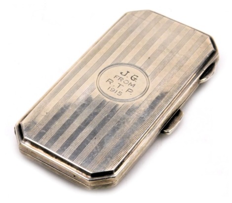 A George V silver cigarette case, of canted rectangular form, with engine turned decoration, circular reserve engraved J.G. from R.T.P. 1915, Birmingham 1912, 1.68oz.