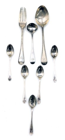 A set of five George V silver coffee spoons, Sheffield 1929, Victorian silver spoon and fork, London 1862, George III silver salt spoon, and two further salt spoons, 3.48oz.