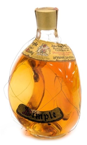 A bottle of John Haig and Company Dimple old blended scotch whisky.