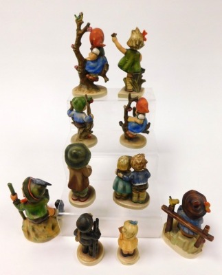 A group of Hummel figures, including Apple Tree Girl, Mountaineer and Chimney Sweep, together with eleven Hummel plates. (qty) - 2