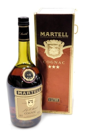 A bottle of Martell three star cognac brandy, 1ltr, boxed.