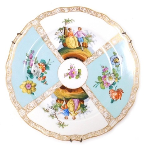 A late 19thC outside decorated Meissen porcelain plate, decorated with reserves of courting figures, and flowers against a turquoise ground, double struck through cross swords marks, 22cm wide.